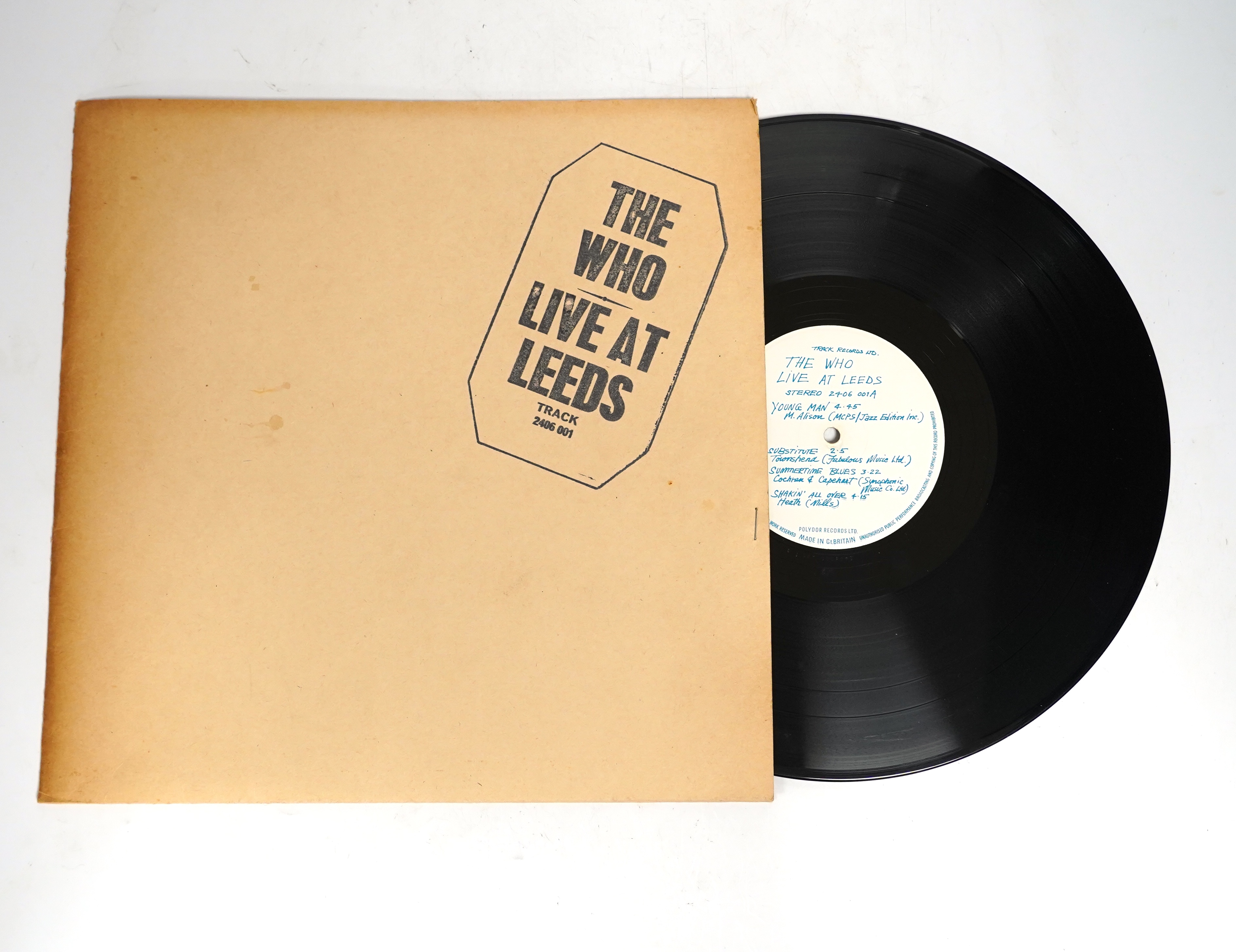 The Who; Live at Leeds LP record album on Track label 2406 001A, with black print to cover, eleven inserts present (poster missing)